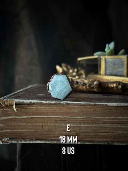 Collection of rings in kunzite, fluorite and aquamarine
