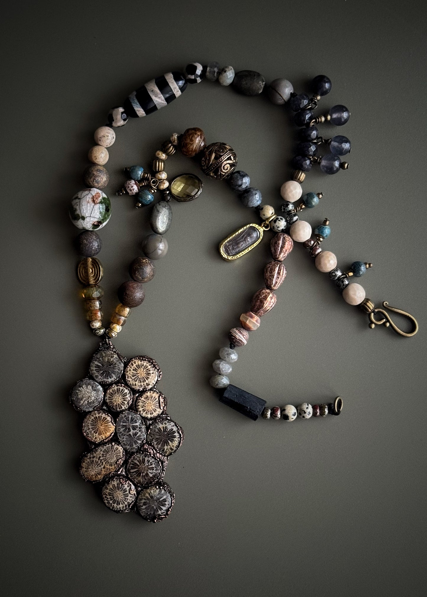Necklace with natural stones and pendant with fossil coral