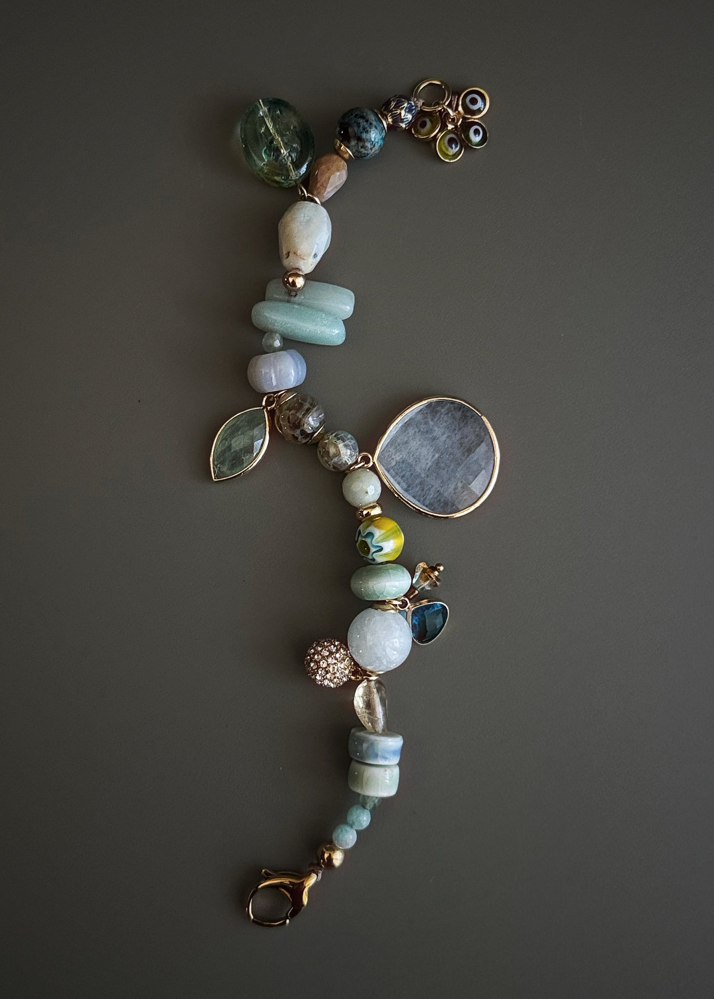 Bracelet with light blue Jade drop, mixed stones and charms - Model 03