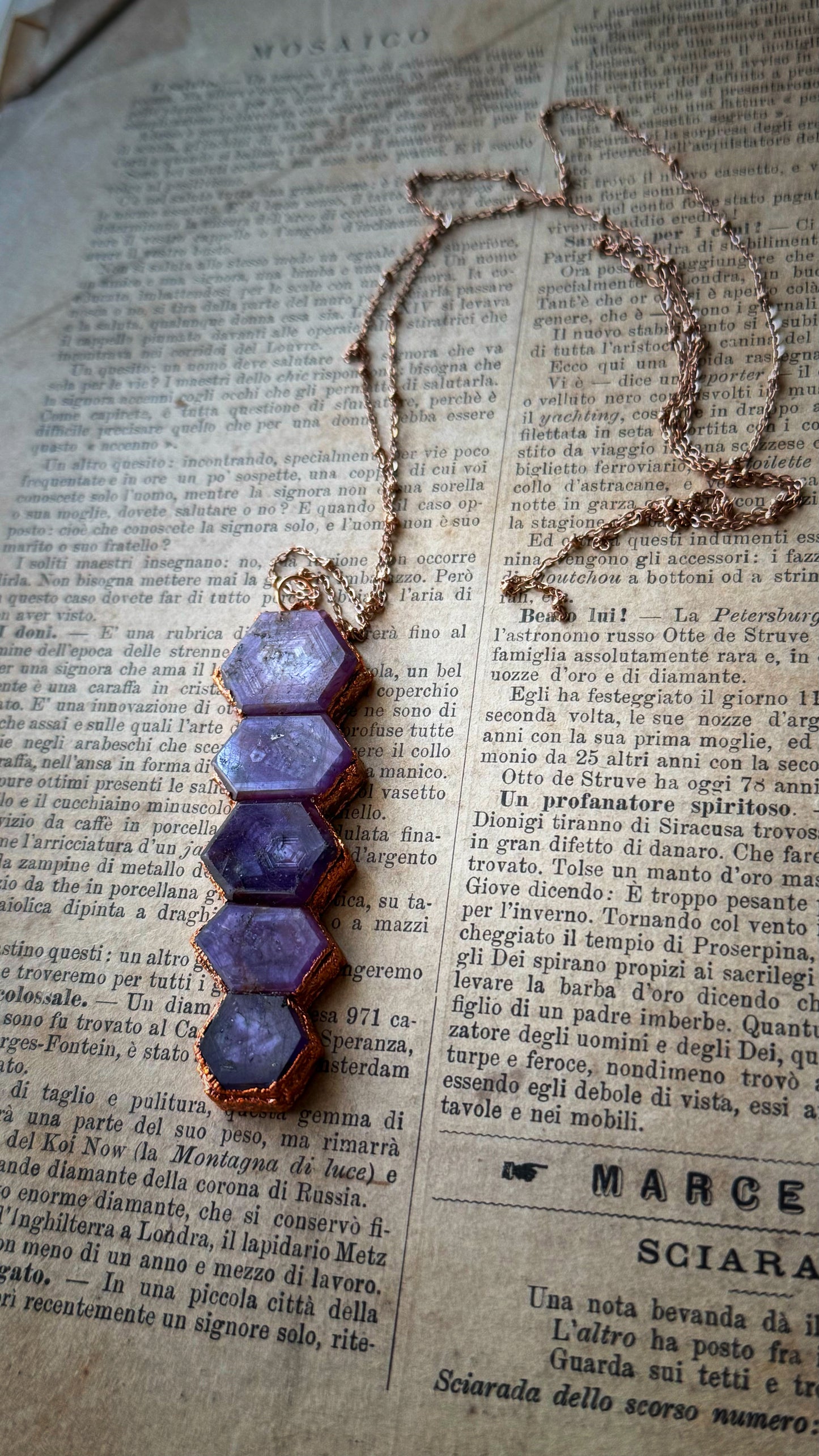 Custom-made copper pendant with ruby root