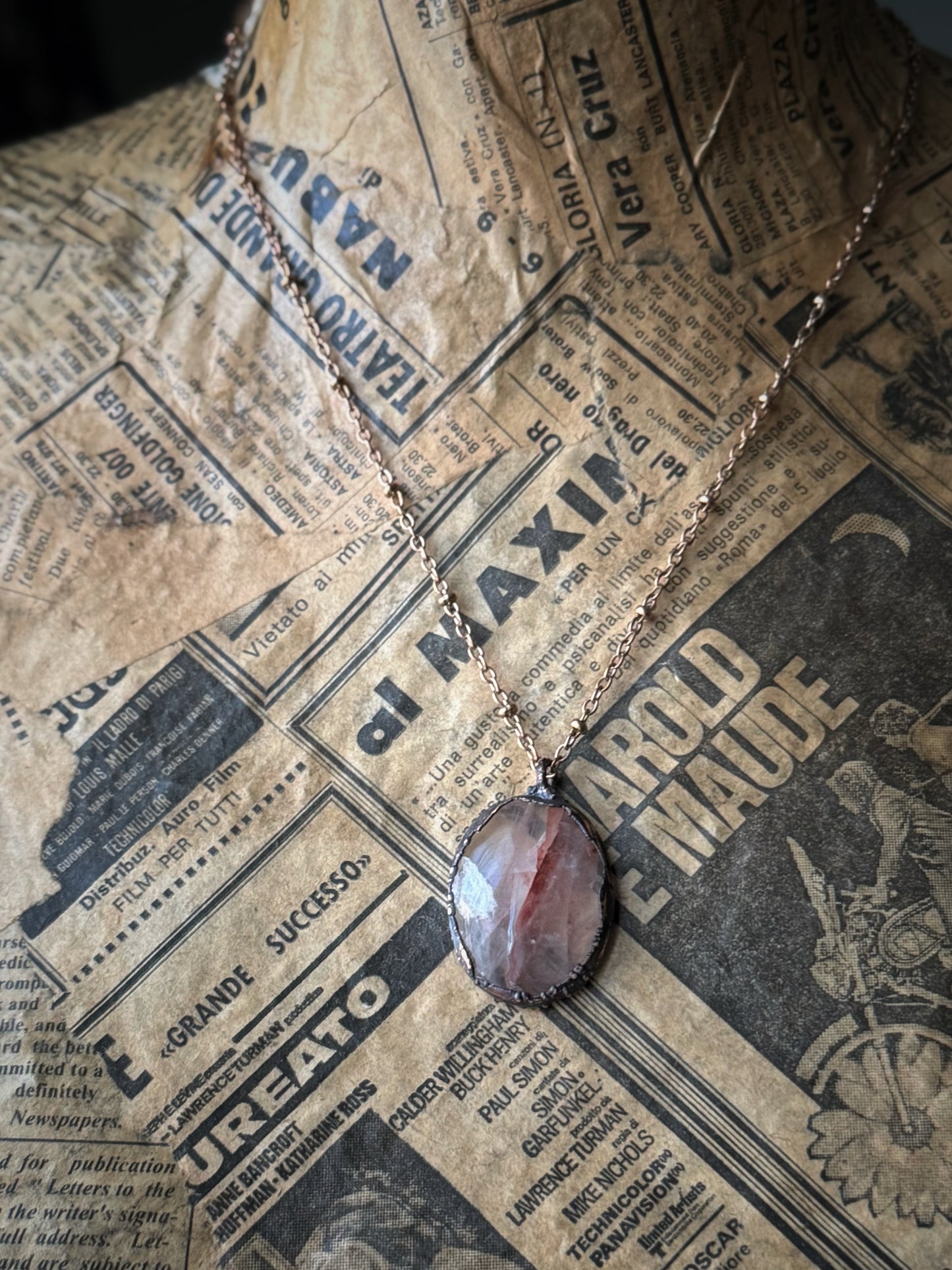 Oval pendant in hematoid quartz