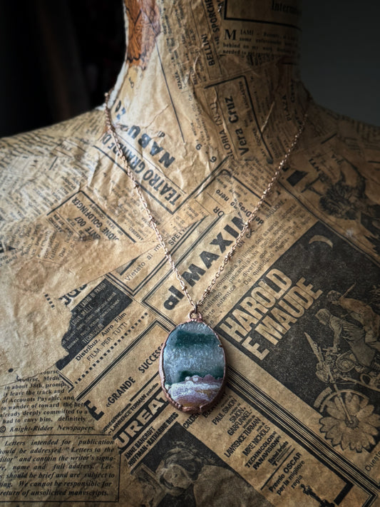 Oval pendant of Moss Agate and quartz infiltration