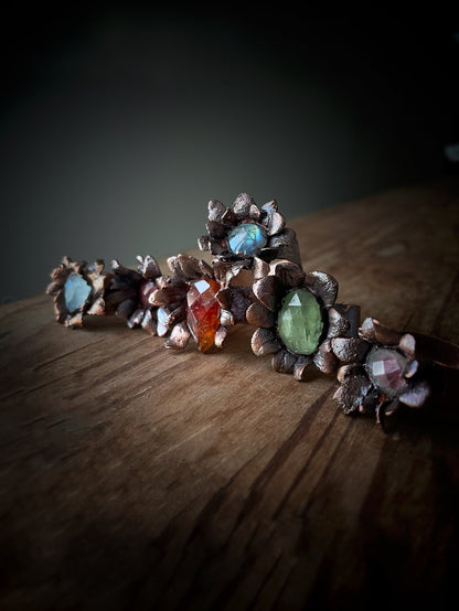 Copper flowers with gemstones. Various sizes
