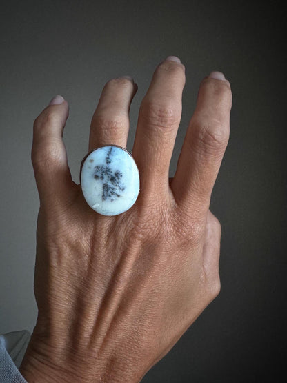 Rings with white dendritic agate stones.