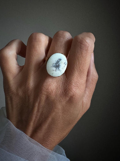 Rings with white dendritic agate stones.