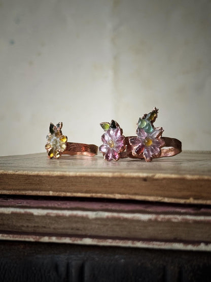 Pink and green tourmaline flower rings