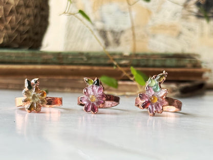 Pink and green tourmaline flower rings